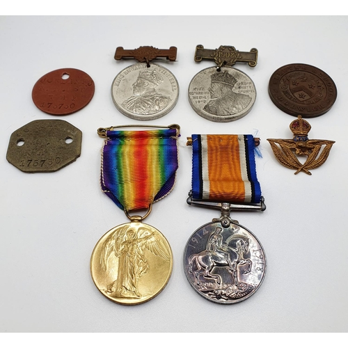 545 - A British War medal and Victory medal pair, awarded 175750 F/Dt F J Jordan RAF, two dog tags, two Lo... 