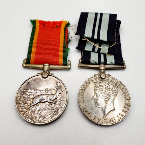 546 - An Africa Service medal, awarded to 152140 F G Tranchell, and an India Service medal (2)