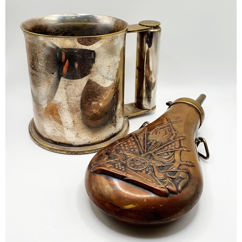 549 - A silver plated tankard, made from a 12PR shell, 1943, 10.5 cm high, and a copper powder flask, with... 