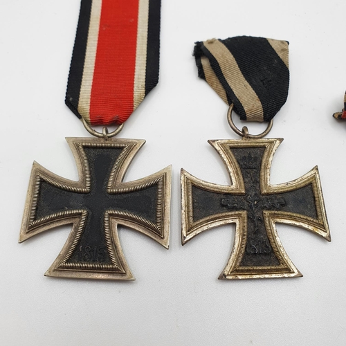 550 - A German Iron Cross, Second Class, another Iron Cross, and other items