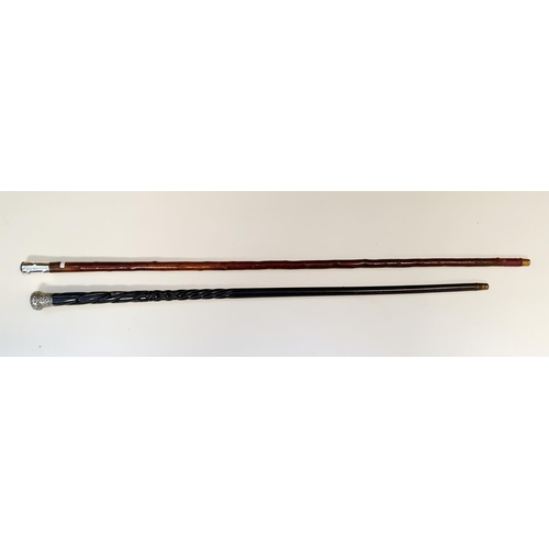 567 - ***Regretfully Withdrawn***Two 19th century silver topped walking canes, dated 1960 and 1893 (2)