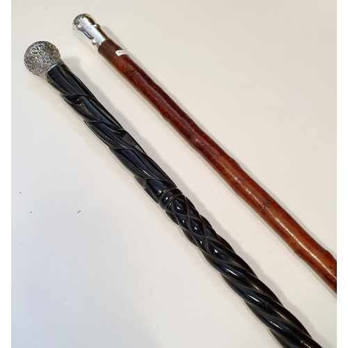 567 - ***Regretfully Withdrawn***Two 19th century silver topped walking canes, dated 1960 and 1893 (2)