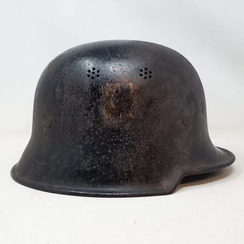 579 - A German steel helmet, the inside painted K Cramer Bollberge Halla S, understood to be a doctor in B... 