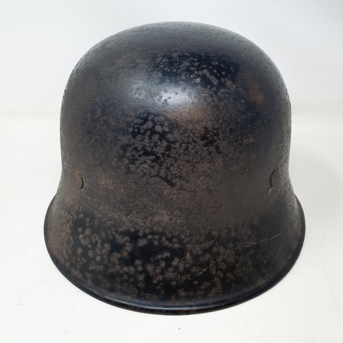 579 - A German steel helmet, the inside painted K Cramer Bollberge Halla S, understood to be a doctor in B... 