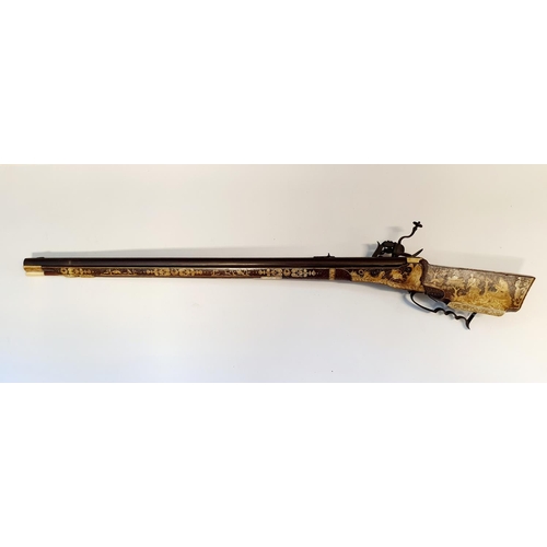 581 - A fine 17th century German wheel lock rifle, having an octagonal barrel of approx. 18 mm and having ... 