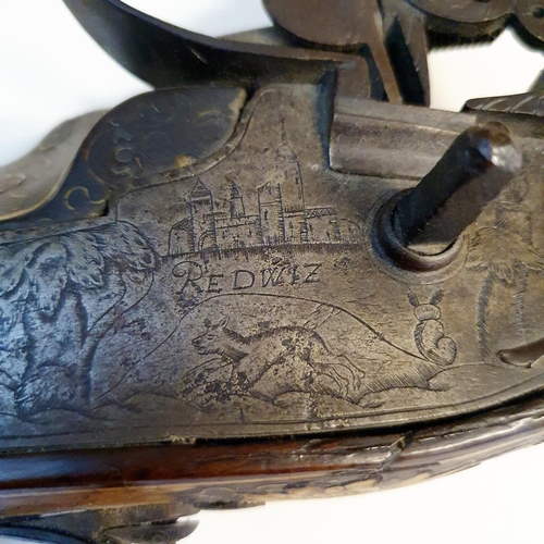 581 - A fine 17th century German wheel lock rifle, having an octagonal barrel of approx. 18 mm and having ... 