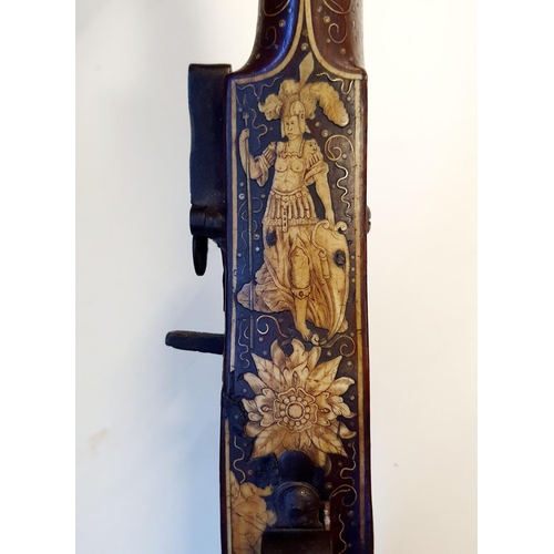 581 - A fine 17th century German wheel lock rifle, having an octagonal barrel of approx. 18 mm and having ... 