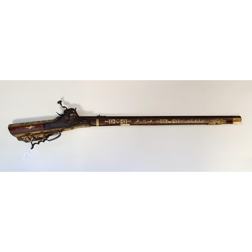 581 - A fine 17th century German wheel lock rifle, having an octagonal barrel of approx. 18 mm and having ... 