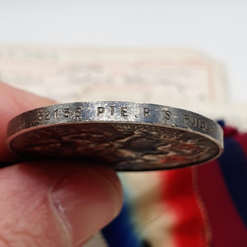 429 - A group of four medals, awarded to 11981 Pte R S Fuller 13/East Surrey Regiment, comprising a Distin... 