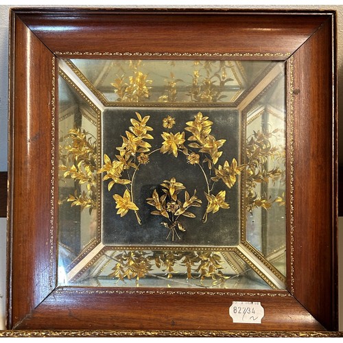 1001 - A carved giltwood frame, 53 x 35 cm, a silk needlework panel, and a Continental gilt floral display,... 