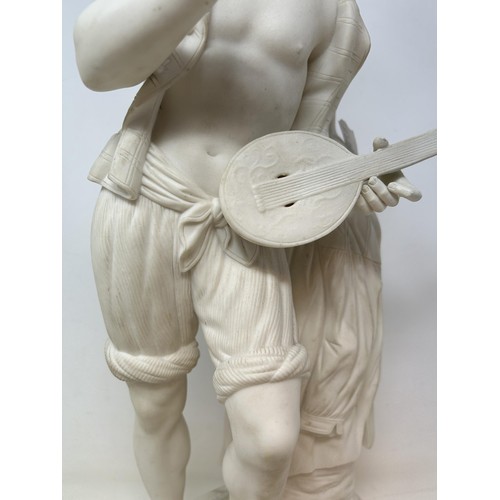 1013 - A Parian figure, of a musician, 46 cm high