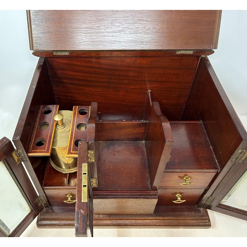 1018 - An early 20th century mahogany smokers cabinet, 37 cm wide