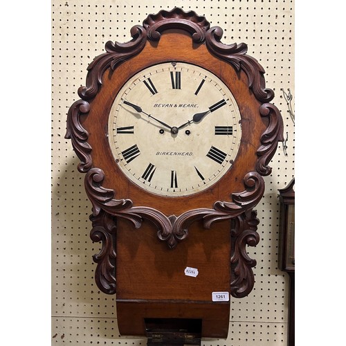 1261 - An oak wall clock, the 30 cm diameter dial signed Bevan & Weare, Birkenhead, with Roman numerals, fi... 