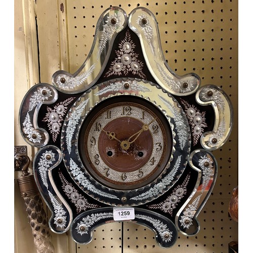 1259 - A Venetian style wall clock, 36 cm high