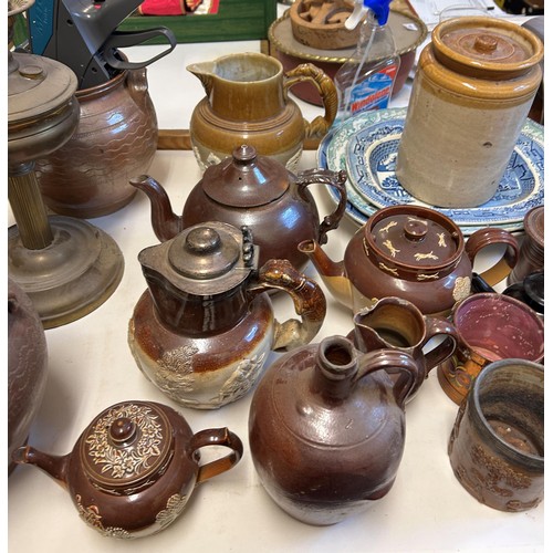 1068 - A large group of assorted stoneware, various meat plates, oil lamps and other items (qty)