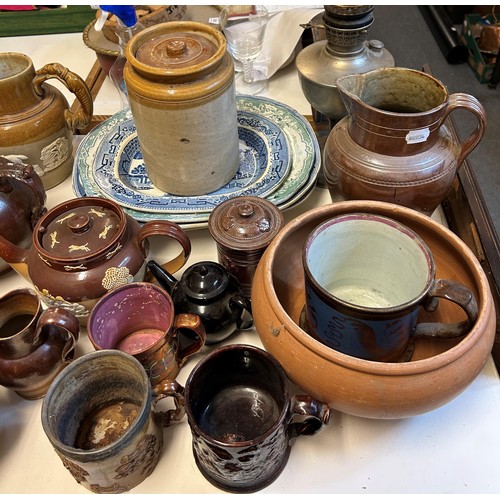 1068 - A large group of assorted stoneware, various meat plates, oil lamps and other items (qty)