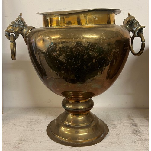 1064 - An Indian brass spittoon, with elephant ring handles, 35 cm high, and a coal bucket (2)