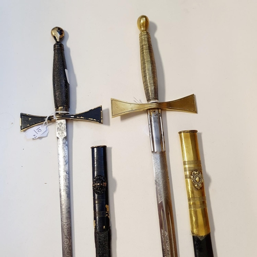 719 - Two Masonic Knights Templar ceremonial swords by Spencer and Co, and Toye & Co, London (2)