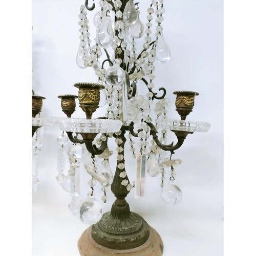 1030 - A pair of glass and metal three light candelabra, some loss, 60 cm high and another similar pair, 33... 