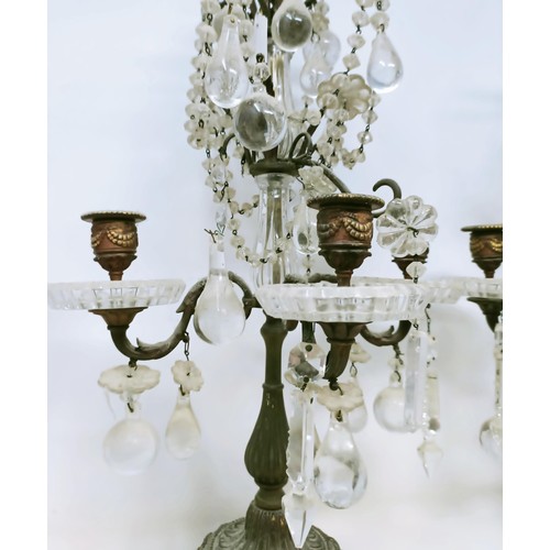 1030 - A pair of glass and metal three light candelabra, some loss, 60 cm high and another similar pair, 33... 