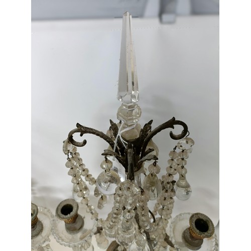 1030 - A pair of glass and metal three light candelabra, some loss, 60 cm high and another similar pair, 33... 