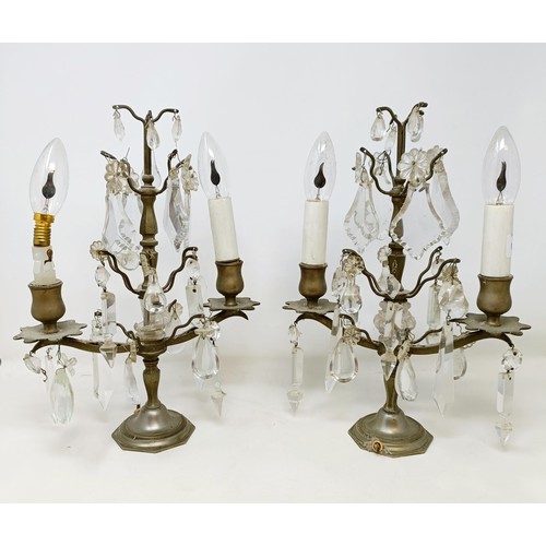 1030 - A pair of glass and metal three light candelabra, some loss, 60 cm high and another similar pair, 33... 