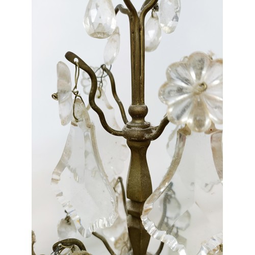 1030 - A pair of glass and metal three light candelabra, some loss, 60 cm high and another similar pair, 33... 