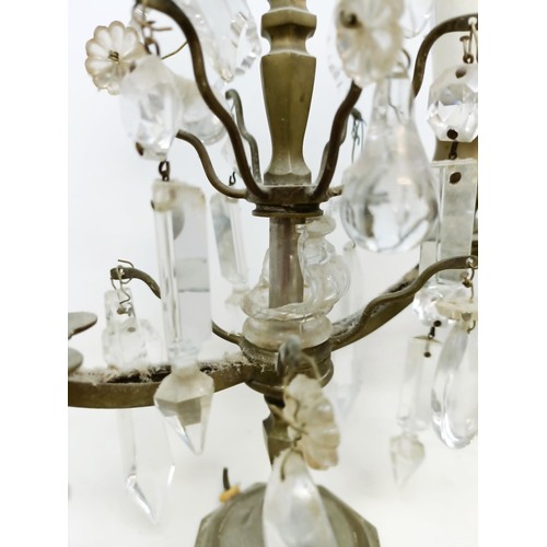 1030 - A pair of glass and metal three light candelabra, some loss, 60 cm high and another similar pair, 33... 