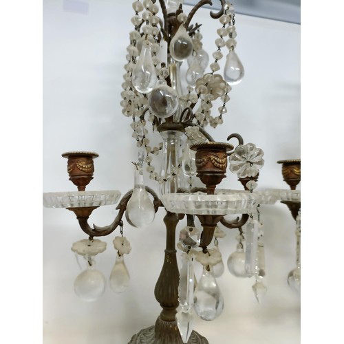 1030 - A pair of glass and metal three light candelabra, some loss, 60 cm high and another similar pair, 33... 