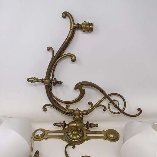 1096 - A pair of Art Nouveau style wall lights, with glass shades, 40 cm wide