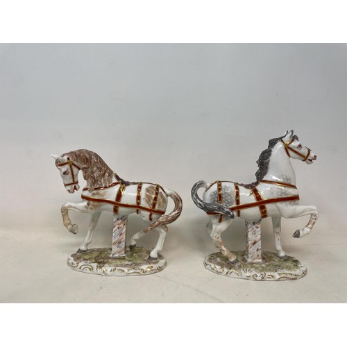 767 - A pair of Dresden horses, 17 cm high