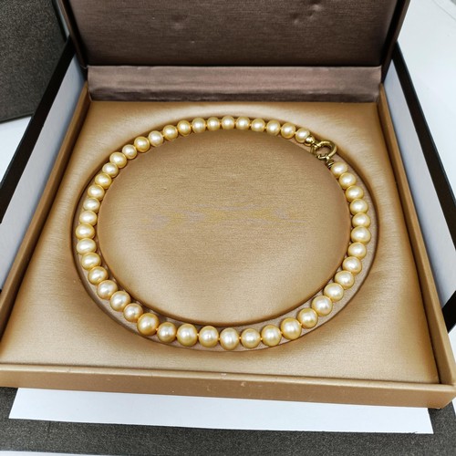 219 - A Mikoya pearl necklace, with an 18ct gold clasp, and matching earrings, in a presentation box