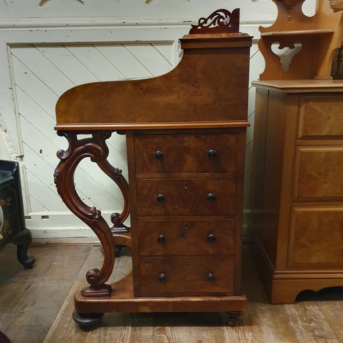 862 - A 19th century piano top walnut Davenport, the interior fitted with various compartments and inset a... 