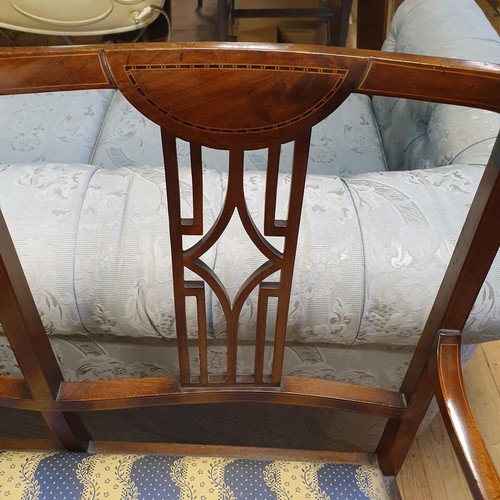 922 - An Edwardian mahogany inlaid two seater sofa