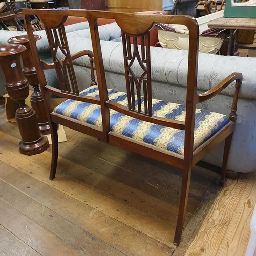 922 - An Edwardian mahogany inlaid two seater sofa