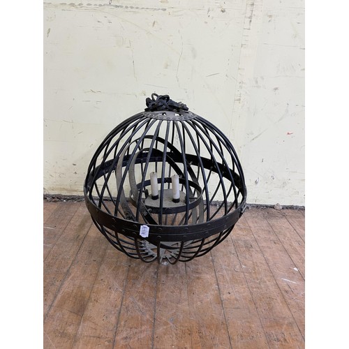 989 - A painted metal ships gimbal candle lamp, 50 cm diameter