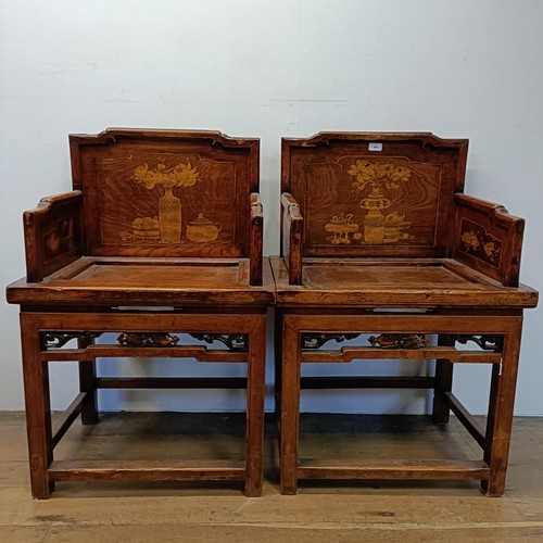 888 - A pair of Chinese chairs, decorated vases and flowers, 62 cm wide (2)