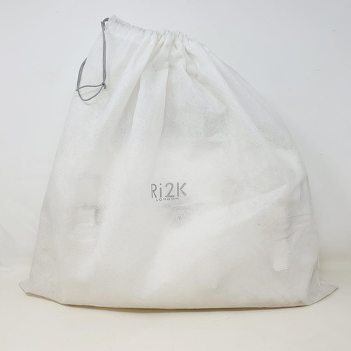 677 - A Jaeger of London white leather handbag and cover, a Ri2K black leather handbag and cover, a Ri2K w... 