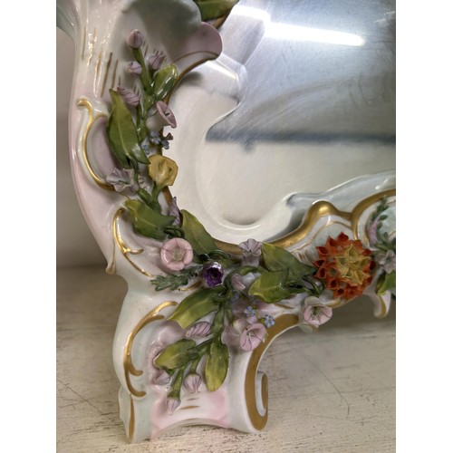 641 - A Dresden porcelain strut mirror, decorated flowers, 48 x 35 cm