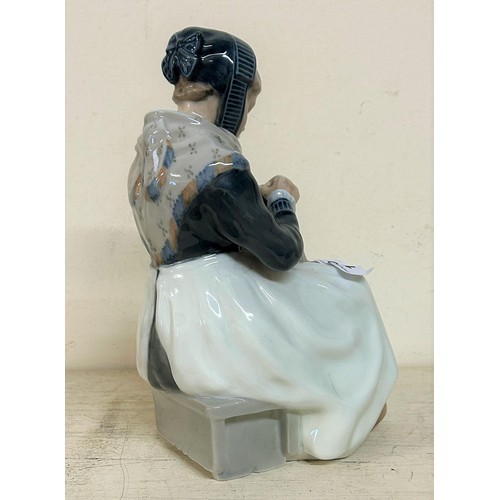 631 - A Royal Copenhagen figure, of a woman, 24 cm high