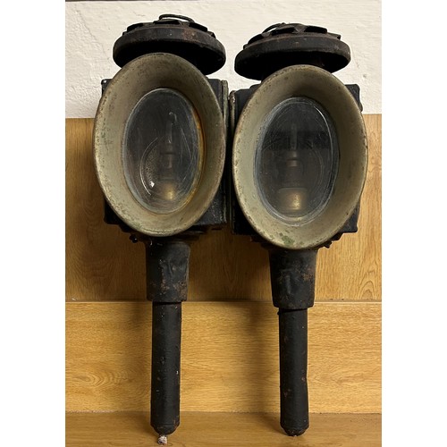 661 - A pair of painted metal carriage lamps, 46 cm high