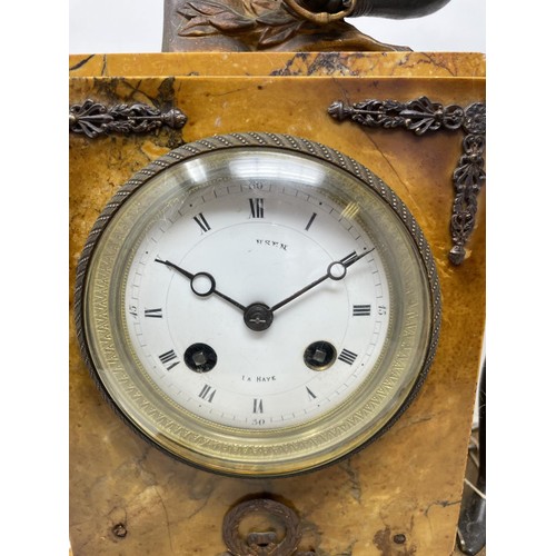 665 - A late 19th/early 20th century French mantel clock, the 9 cm diameter enamel dial with Roman numeral... 