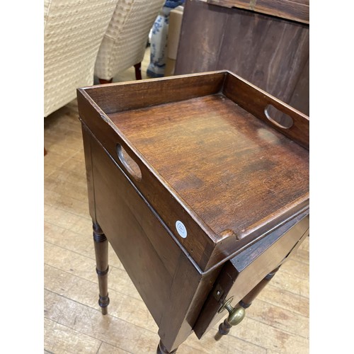 991 - A 19th century mahogany tray top stand, with a single cupboard door, 30 cm wide