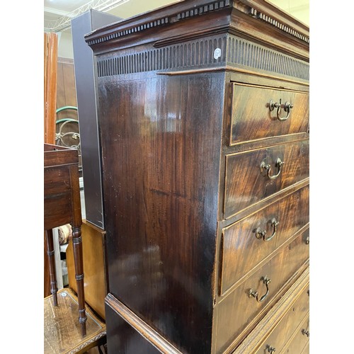 993 - A 19th century mahogany tallboy chest on chest, the top having two short and three long drawers, on ... 