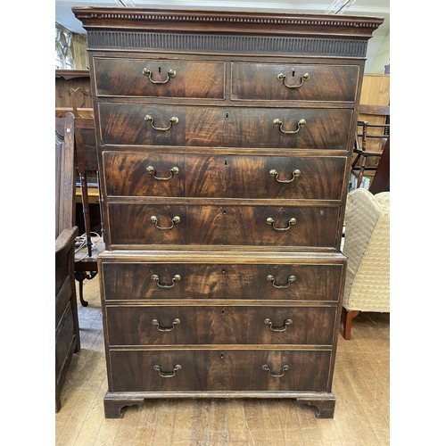 993 - A 19th century mahogany tallboy chest on chest, the top having two short and three long drawers, on ... 