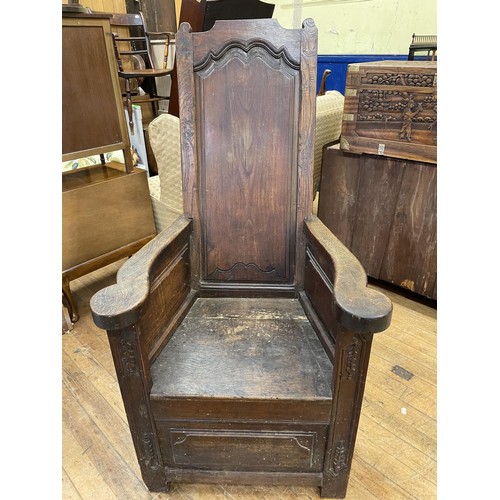 996 - An oak lambing chair, with carved decoration