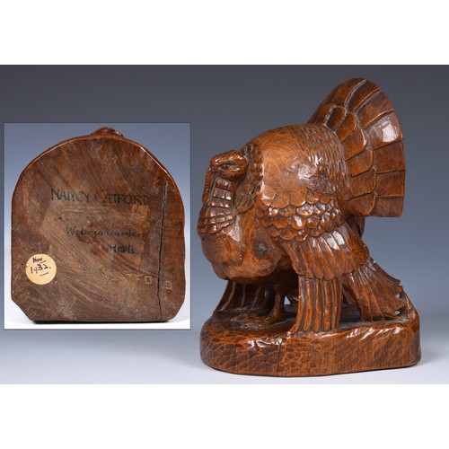 51 - A carved figure of a turkey, by Anna Edith (Nancy) Catford (1905-1992), signed in ink NANCY CATFORD ... 