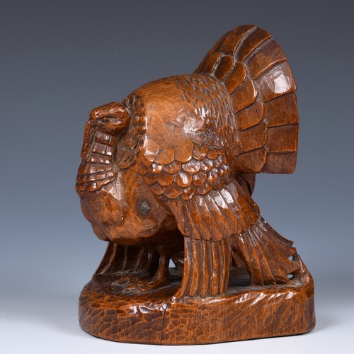 51 - A carved figure of a turkey, by Anna Edith (Nancy) Catford (1905-1992), signed in ink NANCY CATFORD ... 