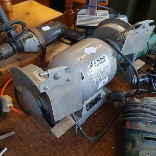 518 - An Axminster belt sander, a Hilka 6 inch bench grinder, and other assorted tools (qty)  Note: From a... 