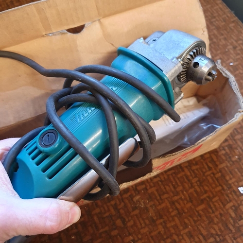 539 - A Makita nibbler, a Makita angled drill, and a scroll saw (3)